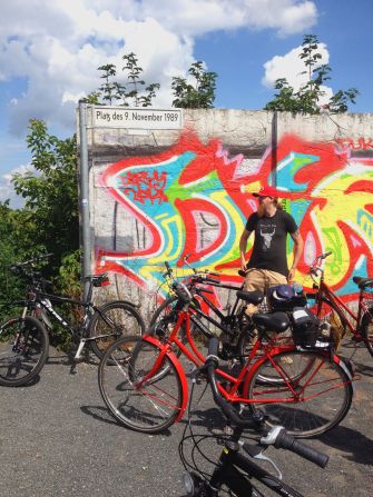 The Platz des November 1989, where thousands of people breached the Berlin Wall 25 years ago, is among destinations on a cycle tour of the Cold War frontier in Berlin.