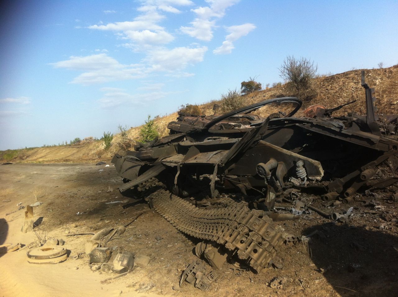 Burnt-out military vehicles litter the countryside in eastern Ukraine, including this example pictured on Tuesday September 2, 2014.