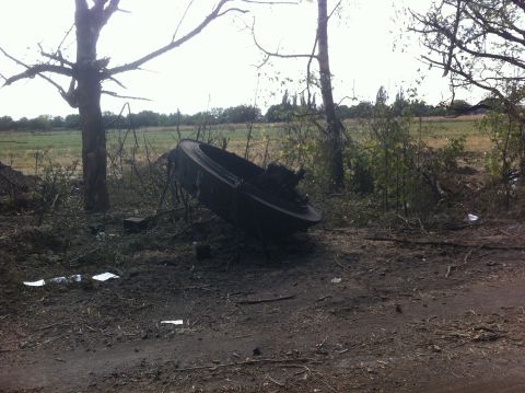 The turret of a destroyed tank, blown 20 meters from the main body of the vehicle, south of Ilovaisk.