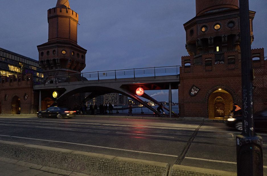 "Rock, Paper, Scissors" lights up in neon every six seconds to reflect the significance of the Oberbaumbrucke bridge connecting Kreuzberg and Friedrichshain, former boroughs that were separated by the Berlin Wall.