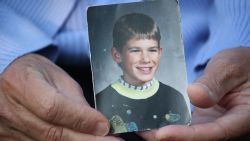 Patty Wetterling holds a photo of her son Jacob, who was abducted at age 11, more than 23 years ago.