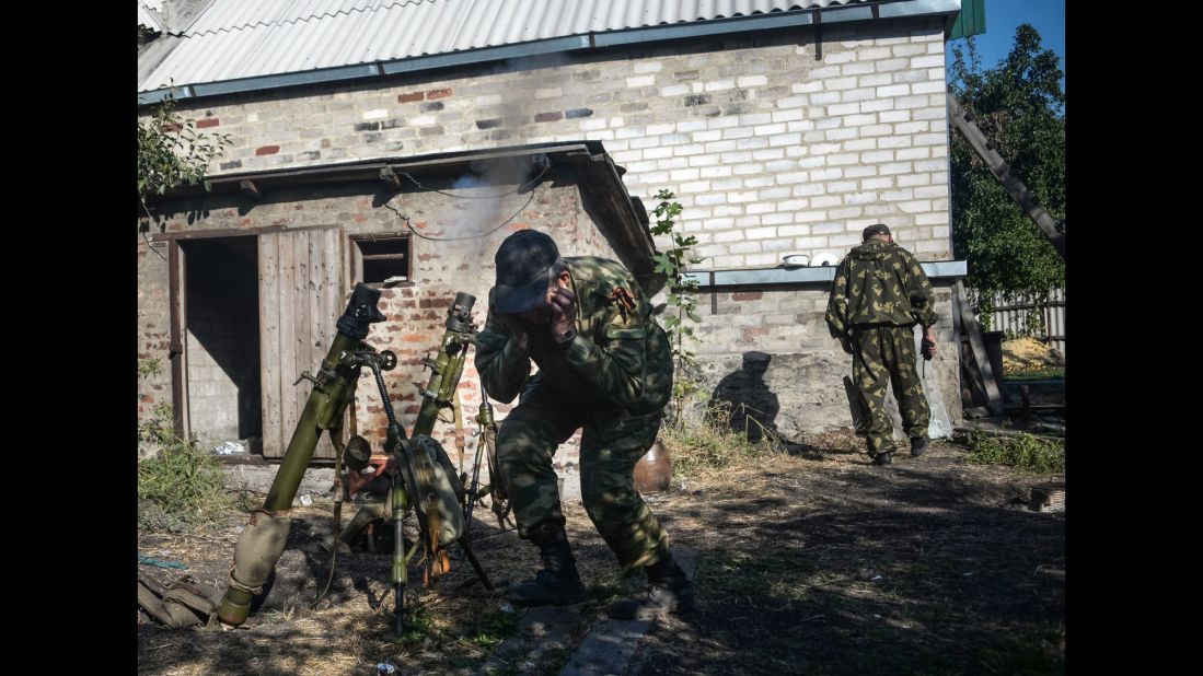 Pro-Russian rebels fire at Ukrainian army positions in Donetsk on September 3.