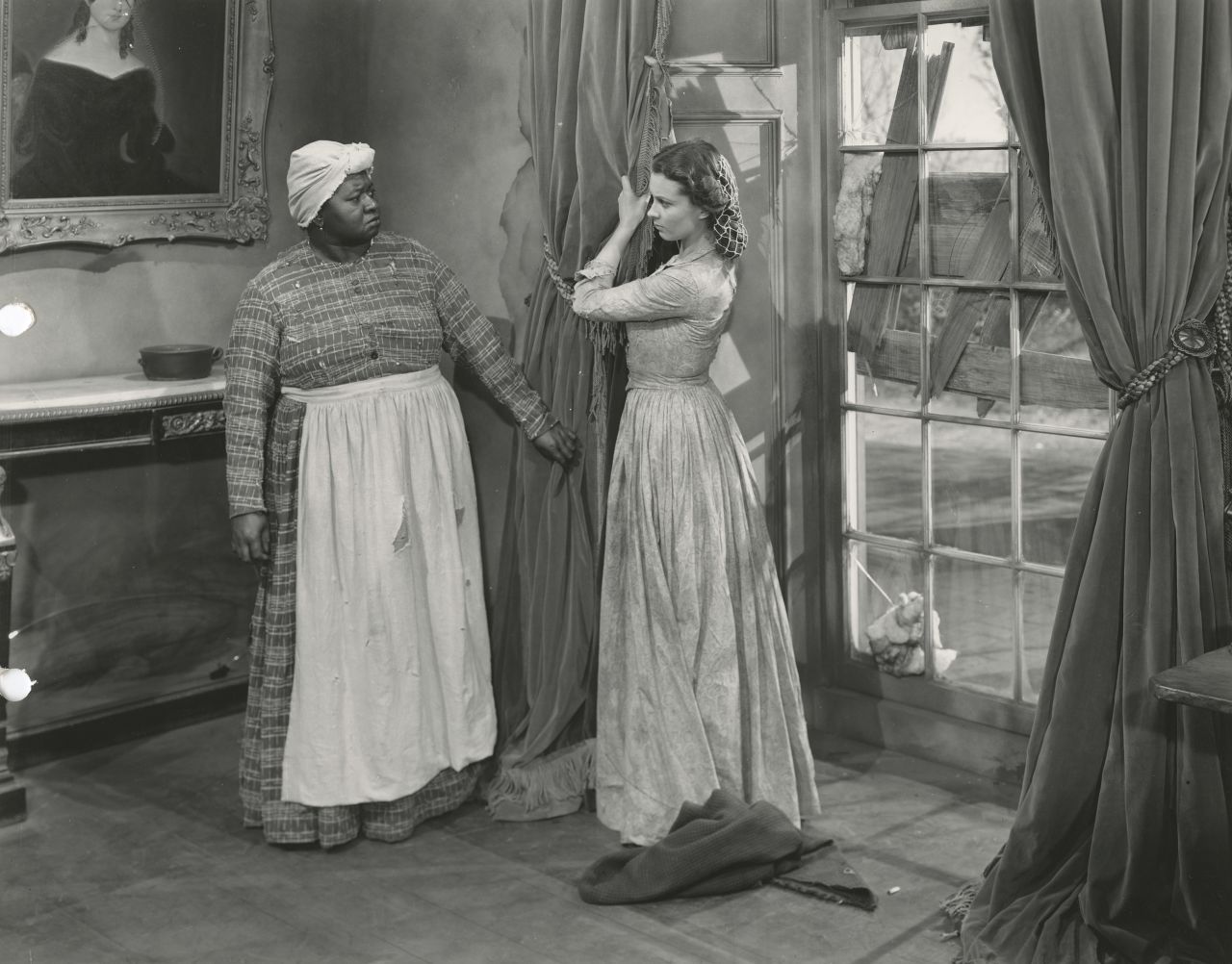 In an iconic scene from the movie, Scarlett (Vivien Leigh) yanks down her mother's curtains for Mammy (Hattie McDaniel) to make a fancy dress to impress Rhett Butler and try to persuade him to give her $300 to pay the taxes on her plantation. "The curtain dress has a special place in everyone's hearts," says Jill Morena, the Ransom Center's assistant curator for costumes and personal effects.