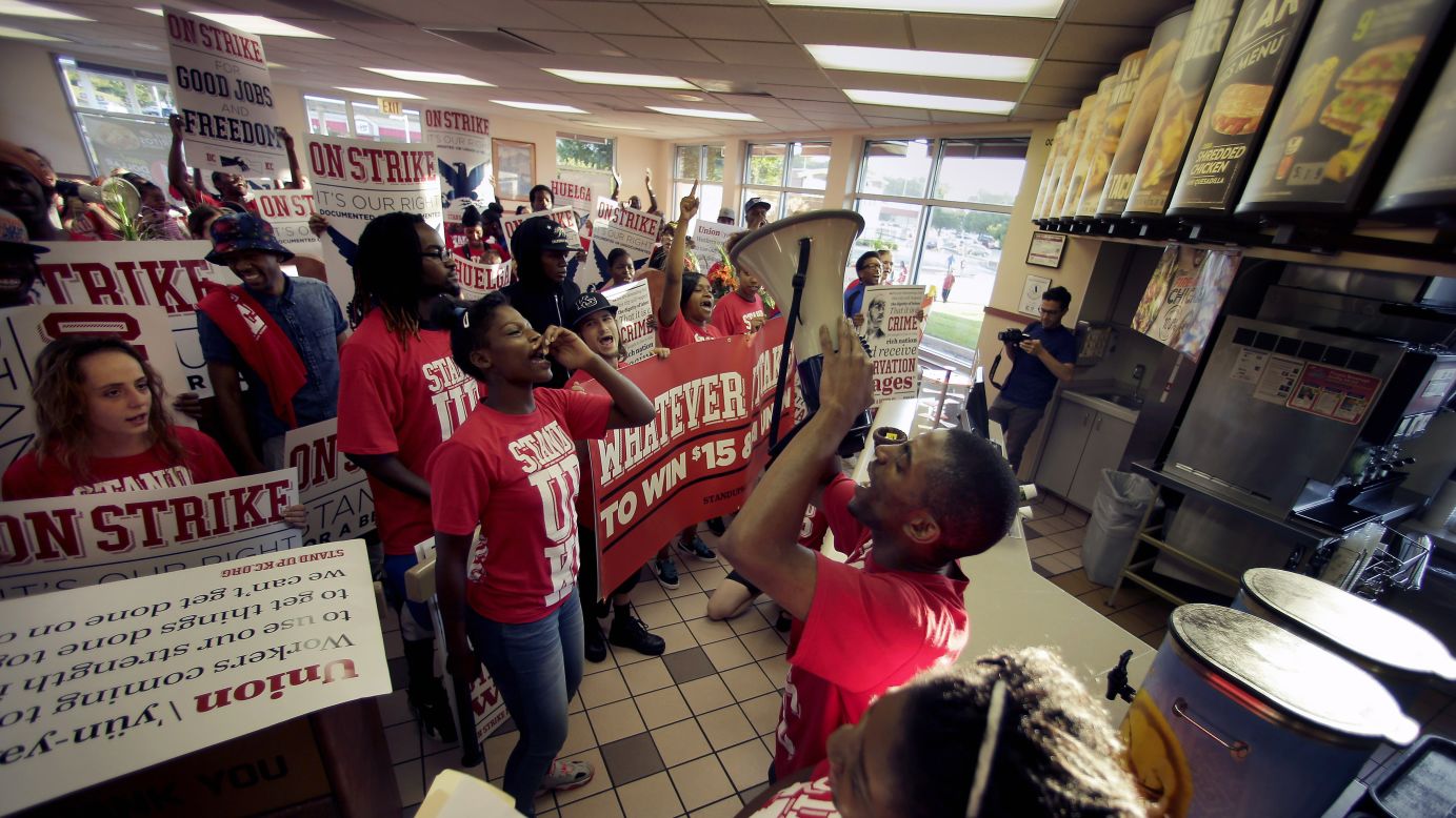 Protesters gather inside a Taco Bell in Kansas City, Missouri, on September 4.