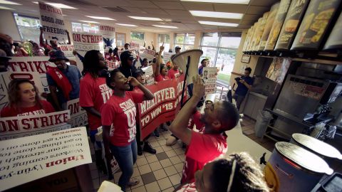 Protesters gather inside a Taco Bell in Kansas City, Missouri, on September 4.
