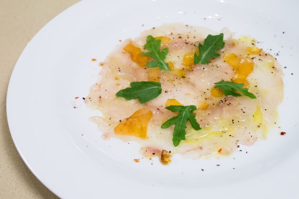 <strong>The dish:</strong> Sliced line-caught sea bass, lemon, piment d'Espelette and shaved bottarga, by chef Dufroux. <br /><br />Dufroux has worked with some of the most recognized chefs and restaurants in the French Basque country such as Chabichou in Courchevel, Hotel du Palais of Biarritz, Michel Guérard, Bernard Loiseau and Hotel les Pyrénnées -- Arrambide Family. 