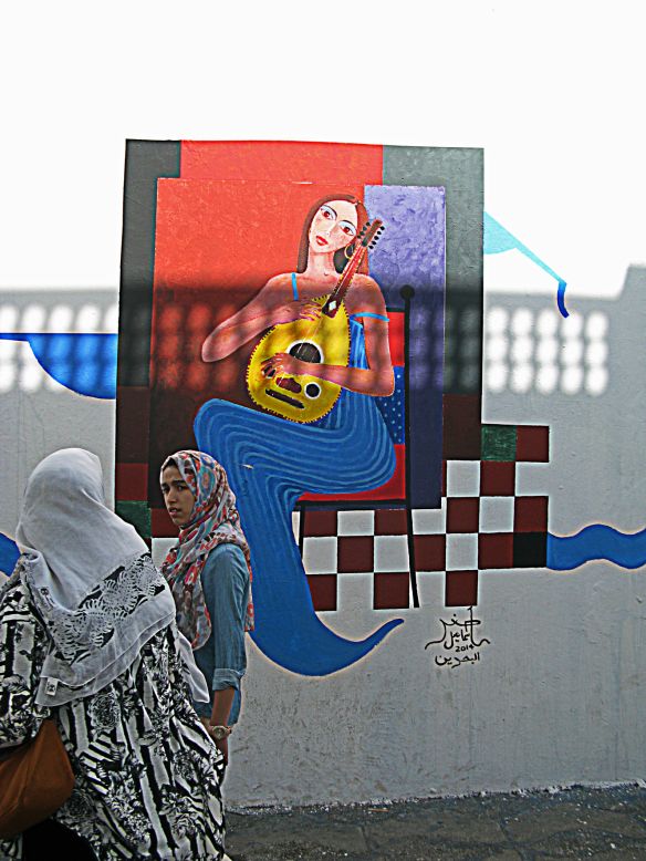Bahraini artist Asghar Ismail drew a picture of a woman holding an instrument on his slice of wall, located near the Assilah seaside. In addition to demonstrating the talents of their painters, the Bahrain delegation also hosted other exhibits, including one that showcased items of traditional dress, such as thobes and embroidered gowns.
