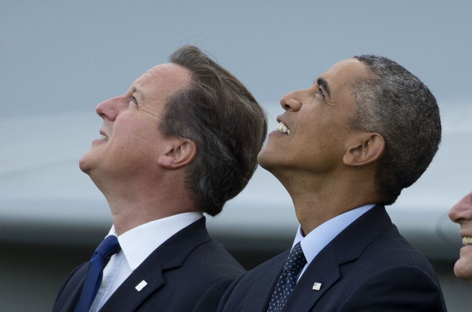 Obama and British Prime Minister David Cameron watch the flyover on September 5.
