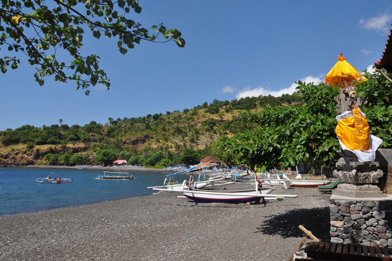 Situated about two hours drive from Ngurah Rai International Airport is Amed, where the sand is of the coarse black volcanic variety.