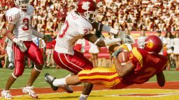 Steve Smith #2 of the University of Southern California Trojans scores a touchdown against Husain Abdullah #23 of the Washington State Cougars in the first half October 29, 2005 at Los Angeles Memorial Coliseum in Los Angeles, California.