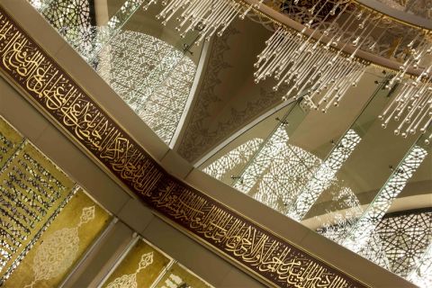 Rather than walls, huge windows covered in intricate metalwork allow light to stream in, "caressing you much like the pages of the Koran," explained Fadillioglu. 