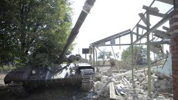 A destroyed tank sits near the wreck of a building in the village of Talakovka, some 22 kms northeast of Mariupol, on September 6, 2014, a day after the signing of a 12-point pact backed by both Kiev and Moscow to end a conflict, which triggered the most serious crisis between Russia and the West since the Cold War. Ukraine said on September 6 that a truce was largely holding in the war-battered east, despite fears it may ultimately fail to halt a pro-Russian insurgency still threatening to tear the country apart. AFP PHOTO/ ALEXANDER KHUDOTEPLY (Photo credit should read Alexander KHUDOTEPLY/AFP/Getty Images)