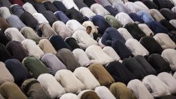 Muslim men conduct Tarawih prayers, during which long portions of the Qur'an are recited, at the East London Mosque on the evening before the start of the holy month of Ramadan on June 28, 2014 in London, England.