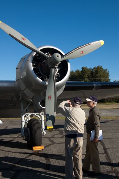 The Douglas C-47/DC-3 was located in 2006 by John Sessions (right), founder of the Historic Flight Foundation of Everett, Washington, which owns the plane.