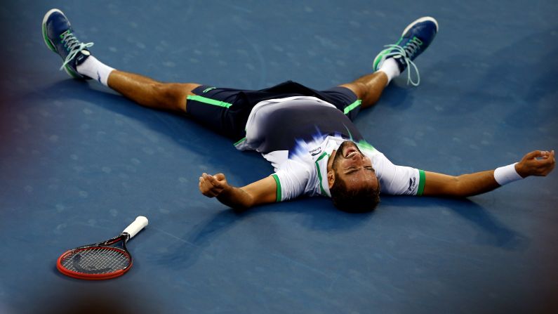 But the final proved a step too far for Nishikori, losing in straight set to Croatia's Marin Cilic, who is pictured celebrating his victory.