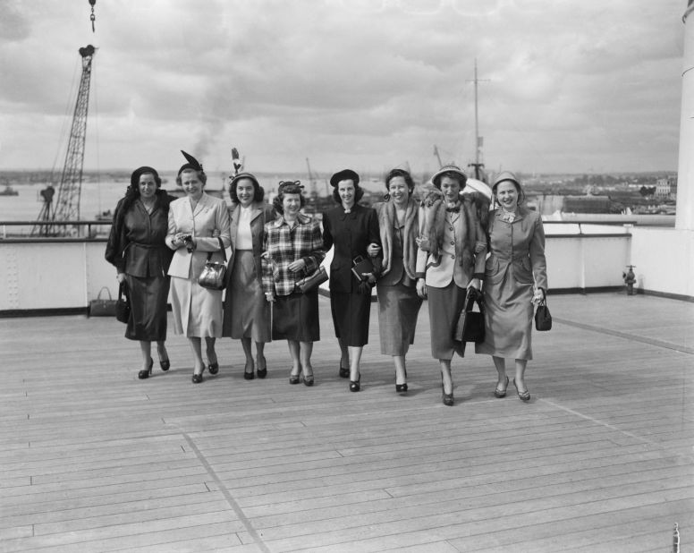 The wives of the 1949 American Ryder Cup team have their pictures taken aboard the "SS Queen Elizabeth" before making the journey to Scarborough in England. The USA won the match 7-5.