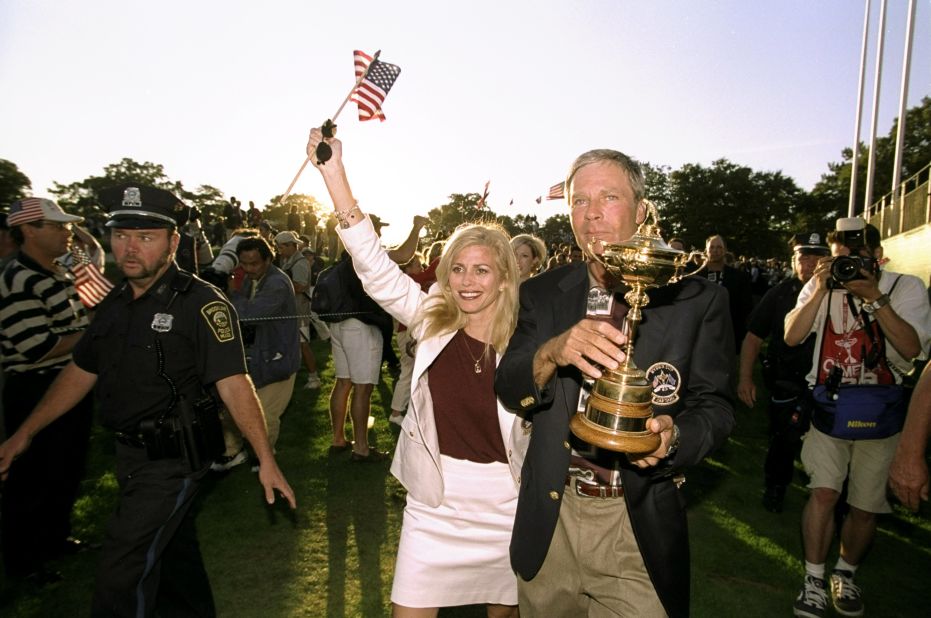 Ben Crenshaw the USA captain, celebrates with his wife after the USA win the 33rd Ryder Cup in 1999, played at Brookline Country Club in Boston, Massachusetts.