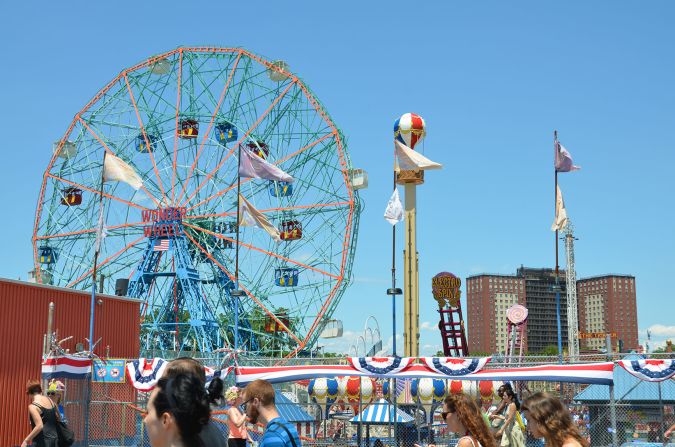 <a href="index.php?page=&url=http%3A%2F%2Fireport.cnn.com%2Fdocs%2FDOC-831726">Coney Island </a>is a Brooklyn neighborhood that features an <a href="index.php?page=&url=http%3A%2F%2Fconeyislandfunguide.com%2F" target="_blank" target="_blank">amusement area </a>with dozens of rides and vendors. Its first amusement park was <a href="index.php?page=&url=http%3A%2F%2Flunaparknyc.com%2Fabout%2Fhistory%2F" target="_blank" target="_blank">Sea-Lion Park</a>, which opened in 1903. Pictured above is <a href="index.php?page=&url=http%3A%2F%2Fwww.wonderwheel.com%2F" target="_blank" target="_blank">Deno's Wonder Wheel Amusement Park</a>, one of several amusement parks operating in Coney Island, drawing scores of visitors daily.