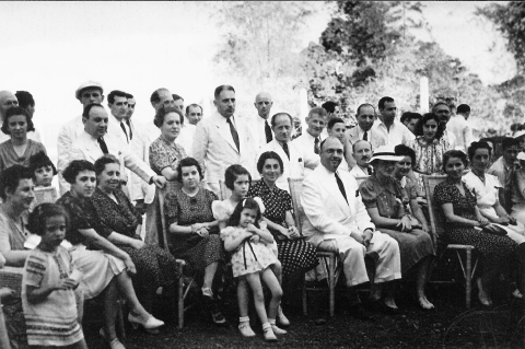 From 1937 to 1941, about 1,200 European Jews found refuge from the Holocaust in the Philippines. Their migration was part of an effort by the Philippines president, Manuel Quezon, the Jewish-American Frieder family, and an American official, Paul McNutt. Several of the Jewish refugees pose with Mr. and Mrs. Alex Frieder in this 1940 picture in the Philippines.