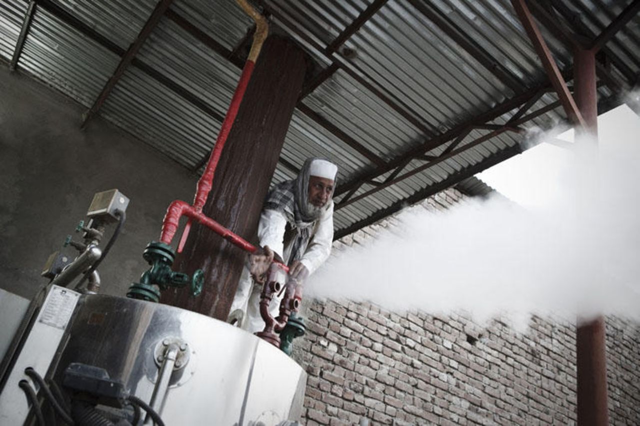 Work in Abdullah Arsala's distillery in Jalalabad. The business has revived since its partnership with 7 Virtues, expanding to several thousand employees, and establishing perfume crops as a viable alternative to the poppy for farmers. 