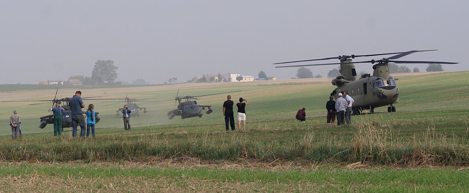 The U.S. helicopters take off after the landing. 