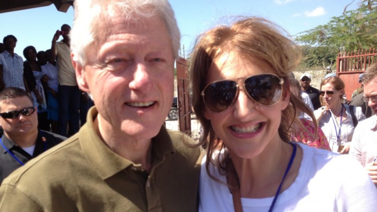 Stegemann and President Bill Clinton on a development trip to Haiti. 