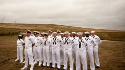 SHANKSVILLE, PA - SEPTEMBER 11: A group of US Navy men gather during 13th anniversary ceremonies commemorating the September 11th attacks were conducted at the Wall of Names at the Flight 93 National Monument September 11, 2014 in Shanksville, Pennsylvania. This year marks the 13th anniversary of the September 11th terrorist attacks that killed nearly 3,000 people at the World Trade Center, Pentagon and on Flight 93. (Photo by )