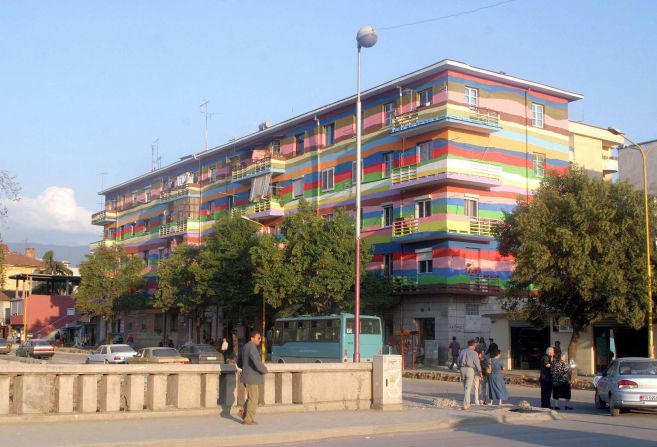 After Albania shook off the shackles of its totalitarian regime in 1992, Tirana's new mayor set about sprucing up drab concrete buildings urging citizens to paint the city in multicolored hues.
