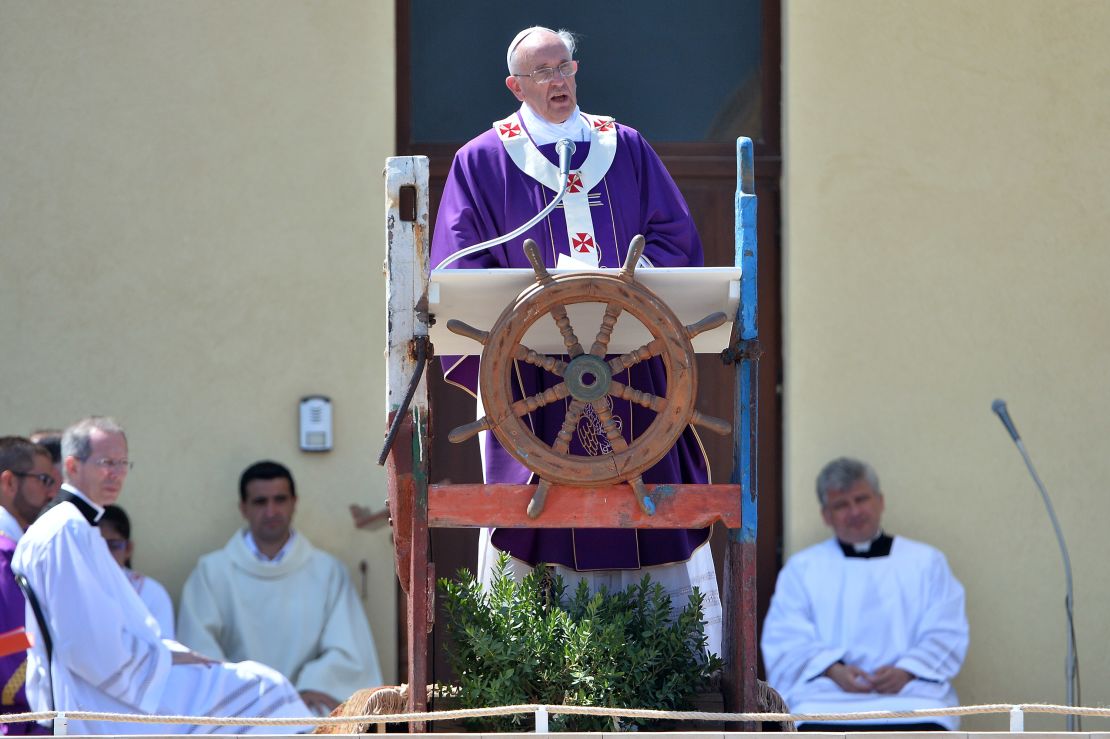 Pope Francis celebrates Mass in 2013 for the migrants who have perished attempting to cross from North Africa to the Italian island of Lampedusa.