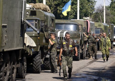A column of Ukrainian forces is seen in Volnovakha, Ukraine, on September 11.