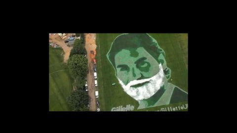 Street Advertising Services (SAS) uses grass advertizing as one of its techniques to grab attention. Roger Federer is seen here spray painted on a hill in Wimbledon during the tennis tournament in 2011. 