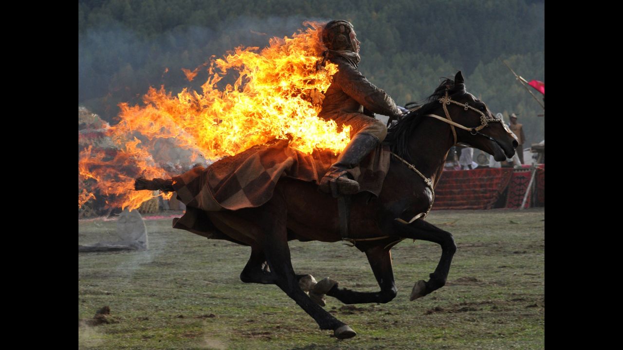 But tradition is also important to Azerbaijan. Here a Kyrgyz stuntman performing during the first World Nomad Games in the Kyrchin (Semenovskoe) gorge, some 300 km from Bishkek. Teams of Azerbaijan, Kazakhstan, Belarus, Mongolia and Tajikistan take part in the games.