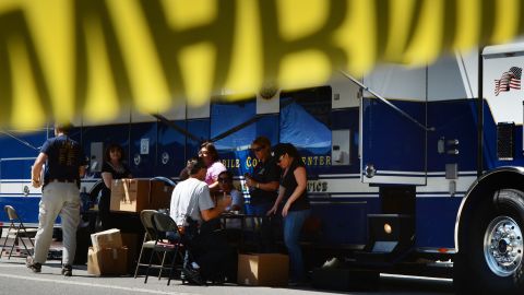 FBI agents work at a command post after raids were conducted in the fashion district of Los Angeles.