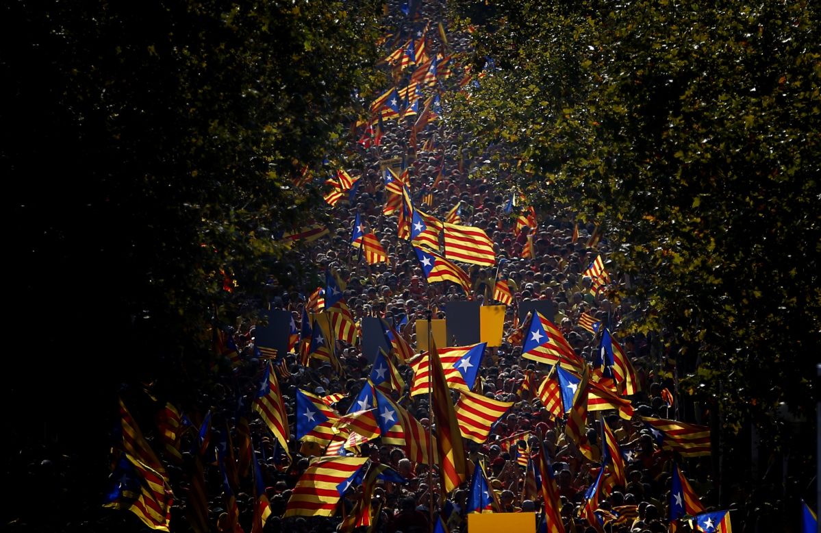 SEPTEMBER 11 - BARCELONA, SPAIN: People wave Catalan  "Estelada" flags during a demonstration calling for the independence of Catalonia. A week before<a href="http://cnn.com/2014/09/10/world/europe/uk-scottish-independence/index.html"> Scotland votes on whether to break away from the United Kingdom,</a> separatists in northeastern Spain are demanding a secession sentiment vote.