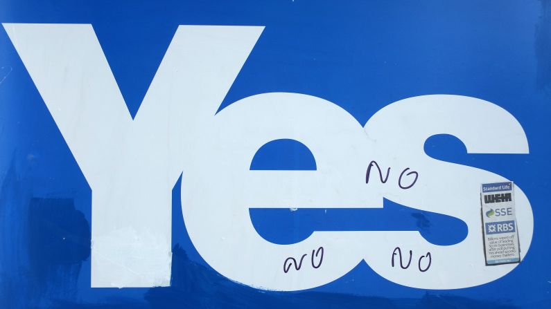 "No" is written on a "yes" campaign placard in Selkirk on September 10.