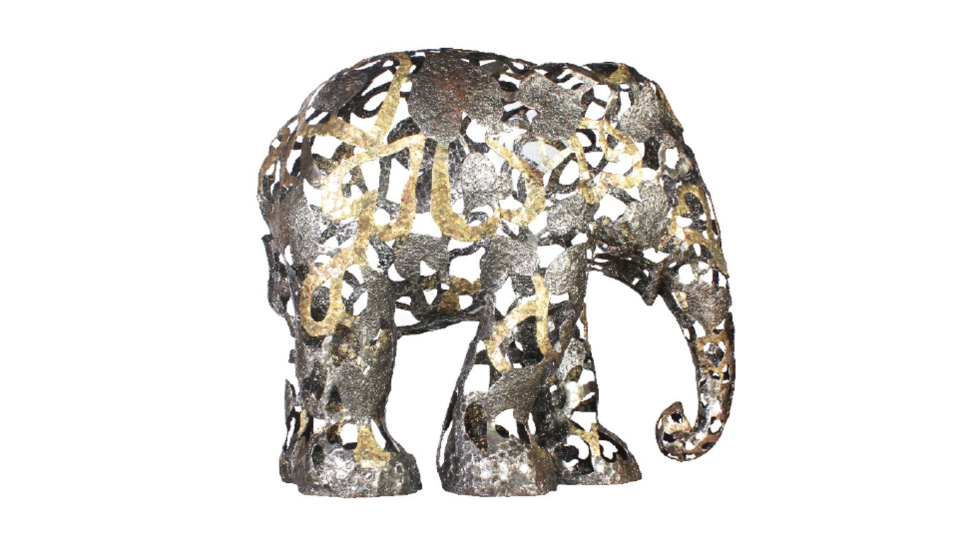 "Hearts in Nature" by Luka Boonkerd Kaewdee captures the strength and delicacy of the elephant. The metallic sculpture sold at auction for HK$250,000 ($32,255), the most any of the elephants fetched.
