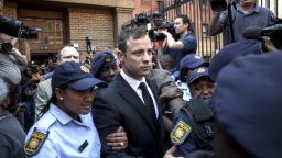 Oscar Pistorius leaves on bail from the North Gauteng High Court on September 12 in Pretoria, South Africa.