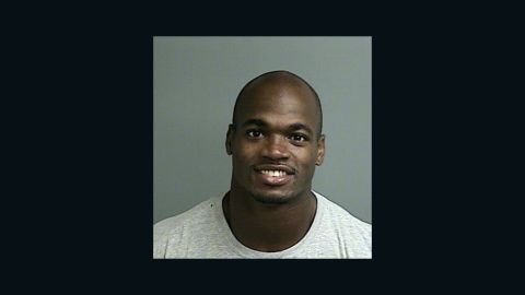 Adrian Peterson turned himself in early Saturday morning.