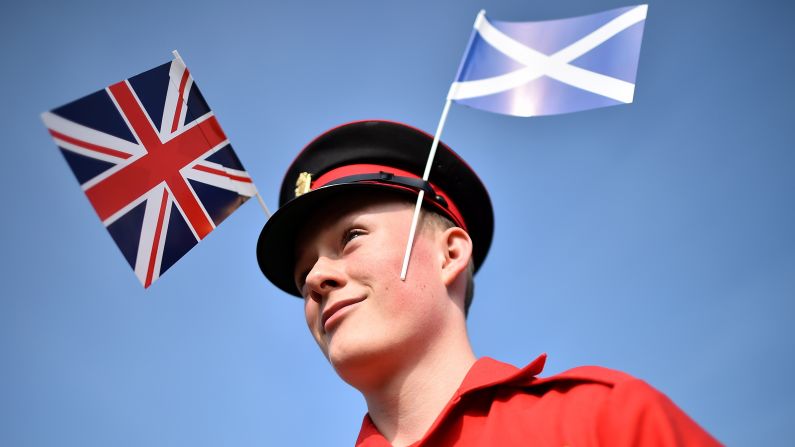 A member of the Grand Orange Lodge of Scotland prepares for a march in Edinburgh on September 13. The Orange Order is a conservative British unionist organization.