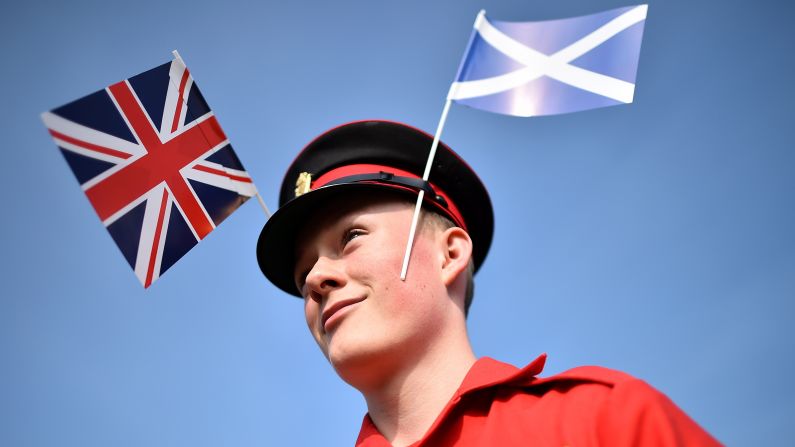 A member of the Grand Orange Lodge of Scotland prepares for a march in Edinburgh on September 13. The Orange Order is a conservative British unionist organization.