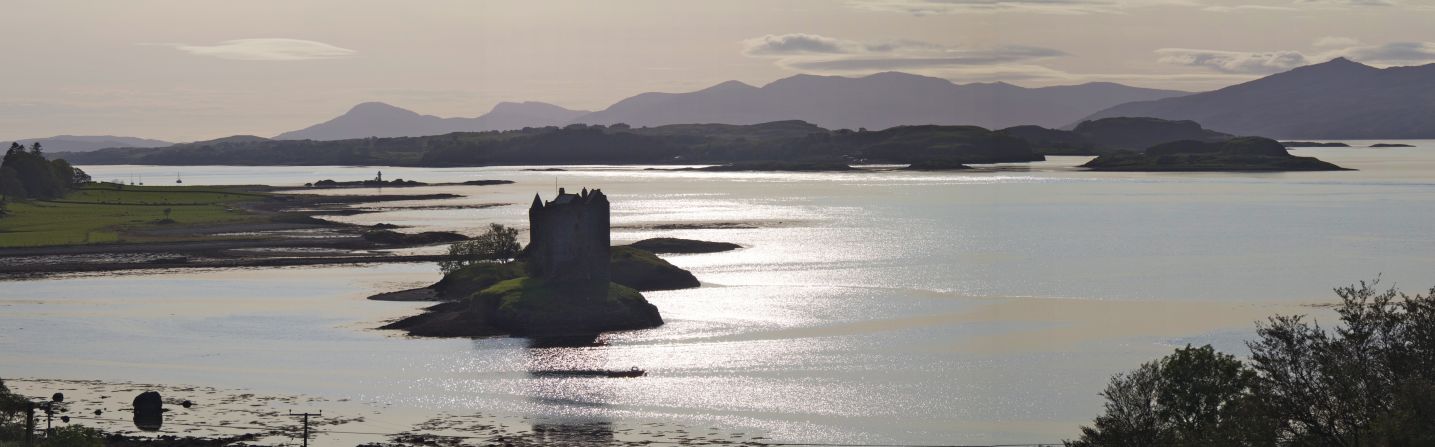 <a href="http://ireport.cnn.com/docs/DOC-1159723">Castle Stalker </a>(meaning "hunter") is surrounded by water near the town of Oban, creating this spectacular view. The castle, which dates to about 1320, is privately owned, so tours are limited. 
