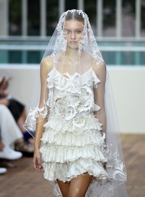 An ultra-feminine theme was created with delicate lace and white chiffon. 