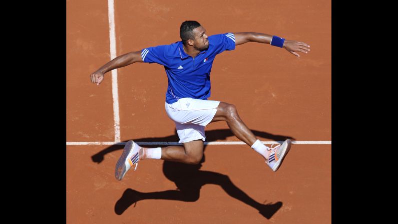 Jo-Wilfried Tsonga of France celebrates Friday, September 12, after winning a Davis Cup singles match in Paris against Lukas Rosol of the Czech Republic. France will take on Switzerland in the Davis Cup final in November.