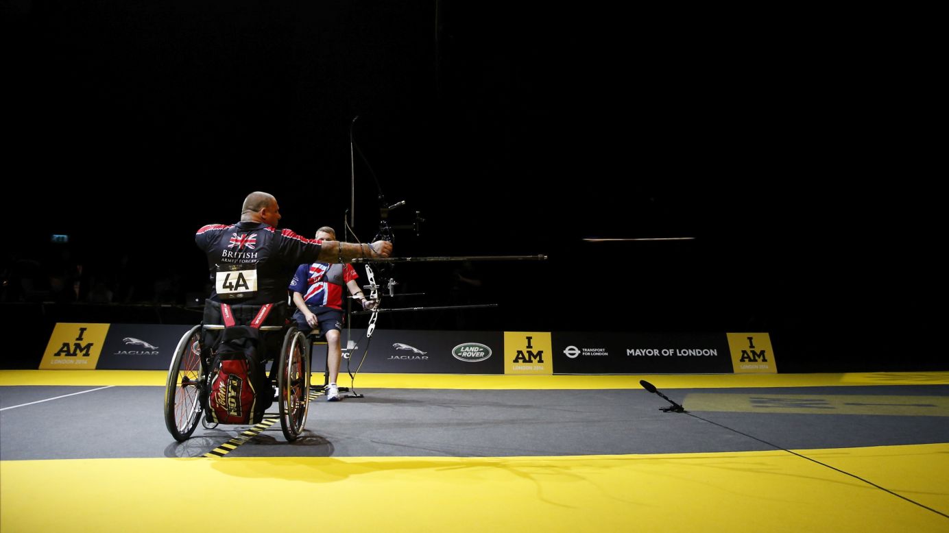 British archer Steven Gill fires an arrow Friday, September 12, during the Invictus Games in London. Some 400 competitors took part in the Invictus Games, which brought together injured service members from 13 nations that have served alongside each other, including Britain, the United States and Canada.