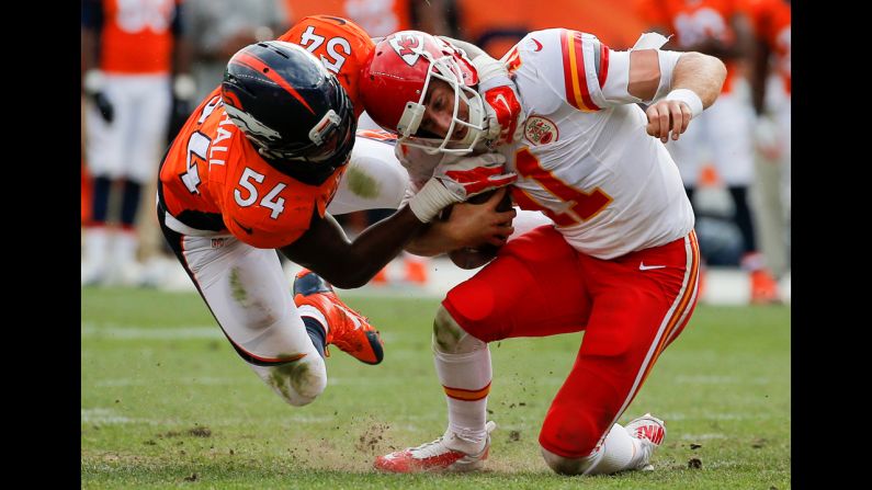 Denver Broncos linebacker Brandon Marshall sacks Kansas City Chiefs quarterback Alex Smith during an NFL game in Denver on Sunday, September 14. The Broncos won 24-17 to improve their record to 2-0 this season.