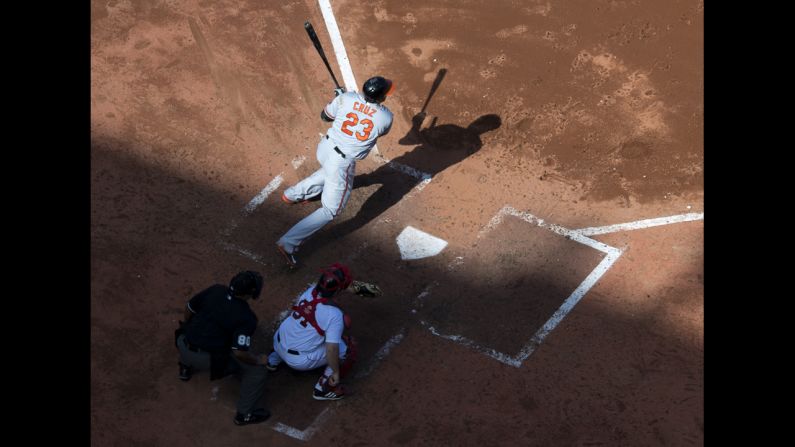 Nelson Cruz of the Baltimore Orioles doubles against the Boston Red Sox during a Major League Baseball game Wednesday, September 10, in Boston. 