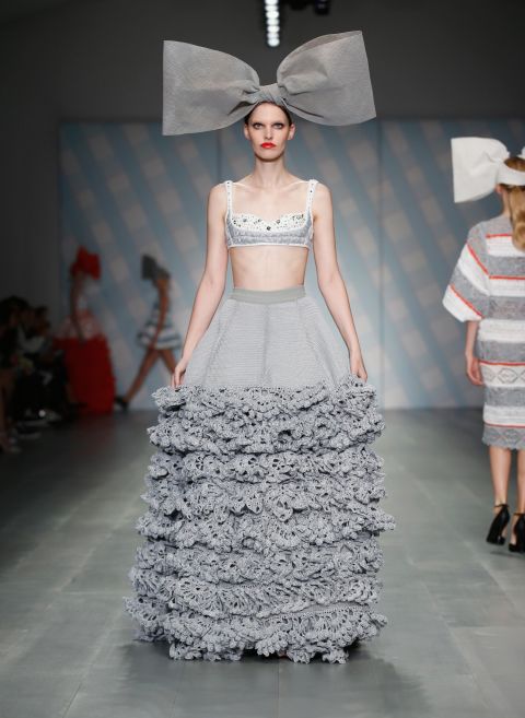 The <a href="http://www.cnn.com/2014/09/17/world/london-fashion-week-memorable-fashion/index.html?hpt=hp_c3">UK-based</a> design trio married intricate knits with a paired down color scheme of black, gray, white, blue and red. 