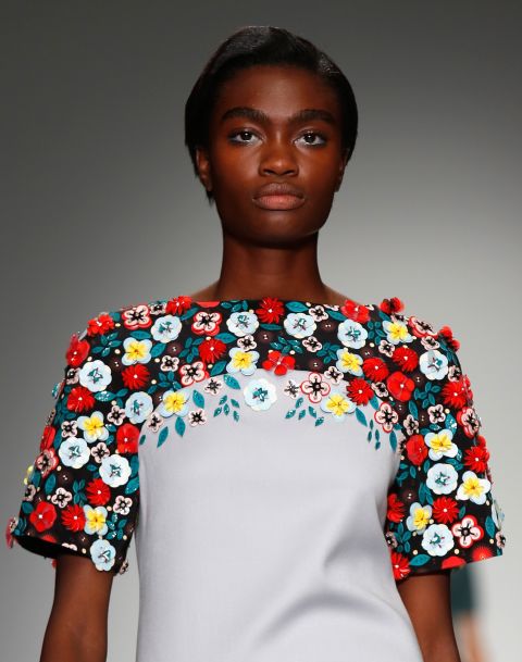 Holly Fulton re-invigorated <a href="http://www.cnn.com/2014/09/17/world/london-fashion-week-memorable-fashion/index.html?hpt=hp_c3">the 60's silhouette</a> with embellished flowers and geometric prints. 