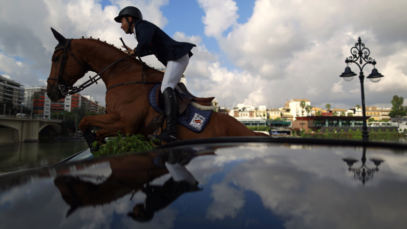 Francisco Gavino competes in a horse jumping event in Seville, Spain, on Thursday, September 11.
