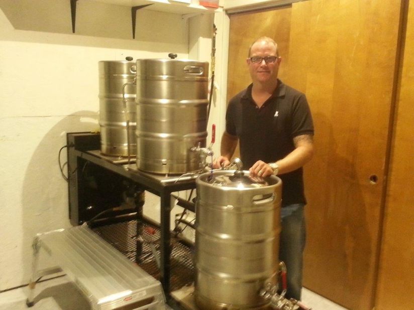 Club owner Scott Conrad oversees beer production backstage.